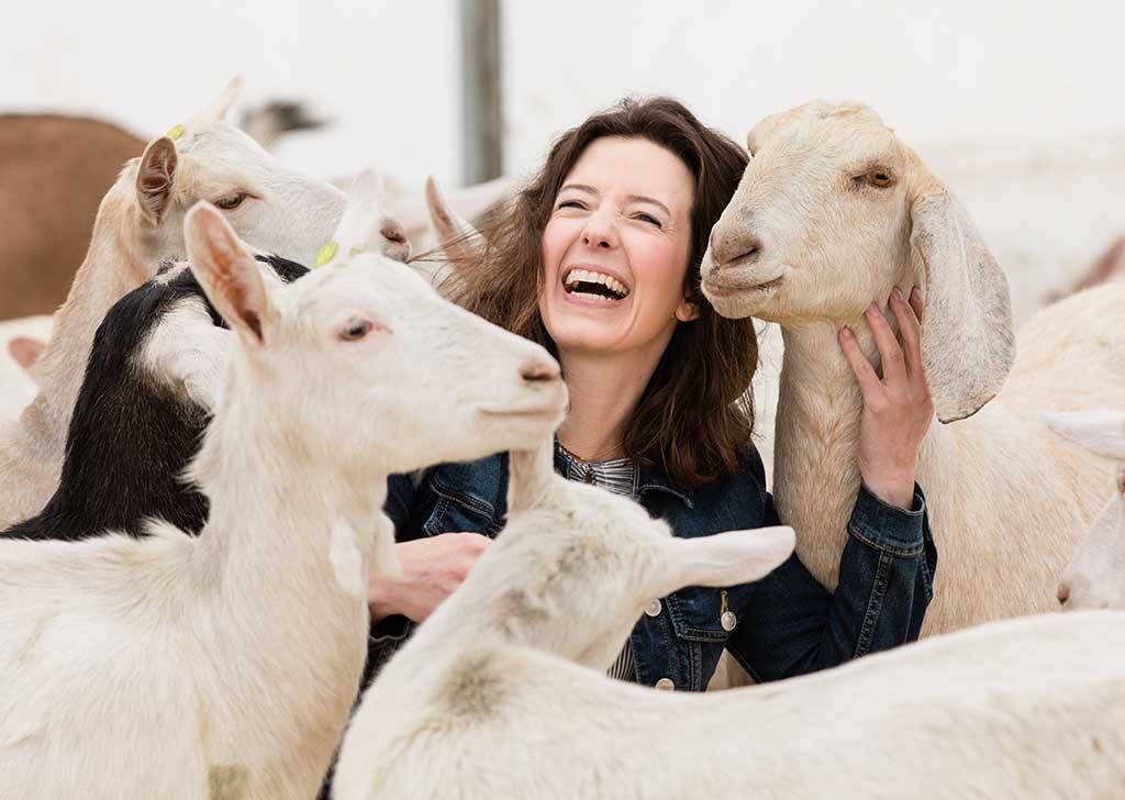 Woman at goat milk dairy farm