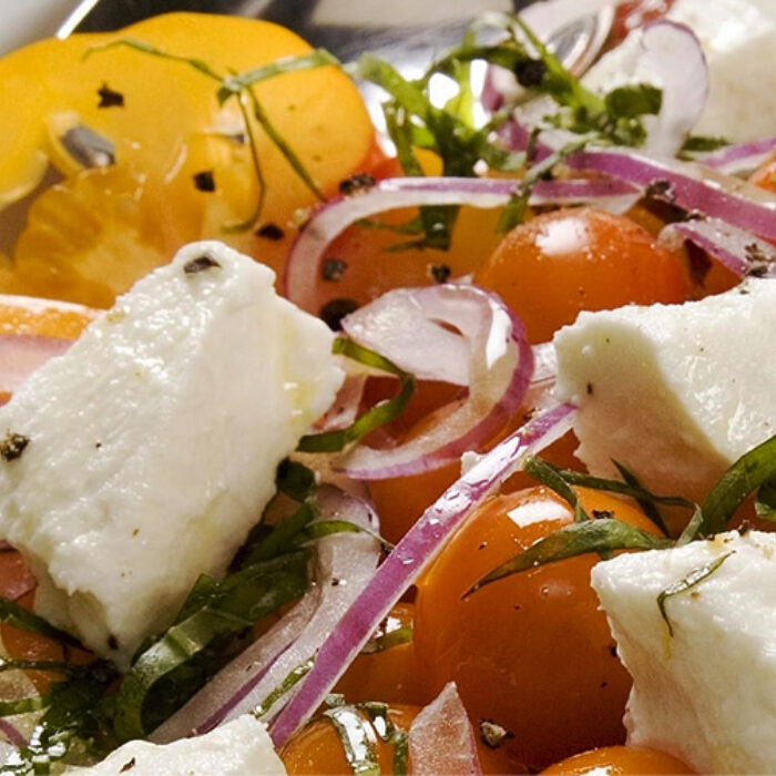 Heirloom-Tomato-Salad-with-Thyme-Rosemary-Marinated-Goat-Cheese_021219